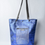 Large metallic blue handmade leather tote bag with star design and front pocket