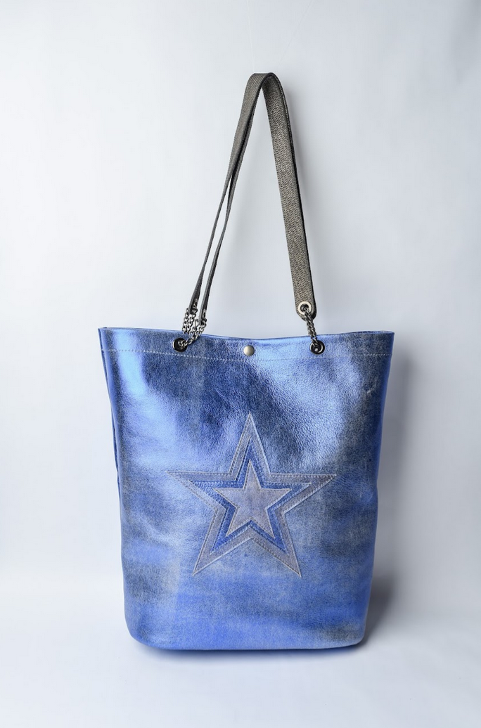 Large metallic blue handmade leather tote bag with star design and front pocket